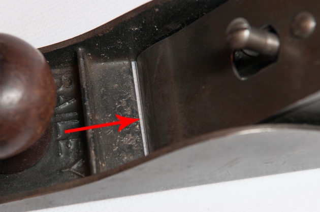 Figure 6 - The edge of the iron should extend over the mouth opening as shown